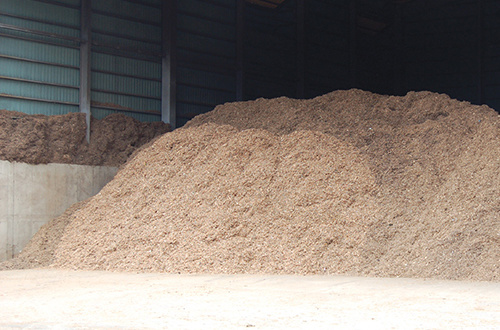 Biomass fuel produced from wood wastes